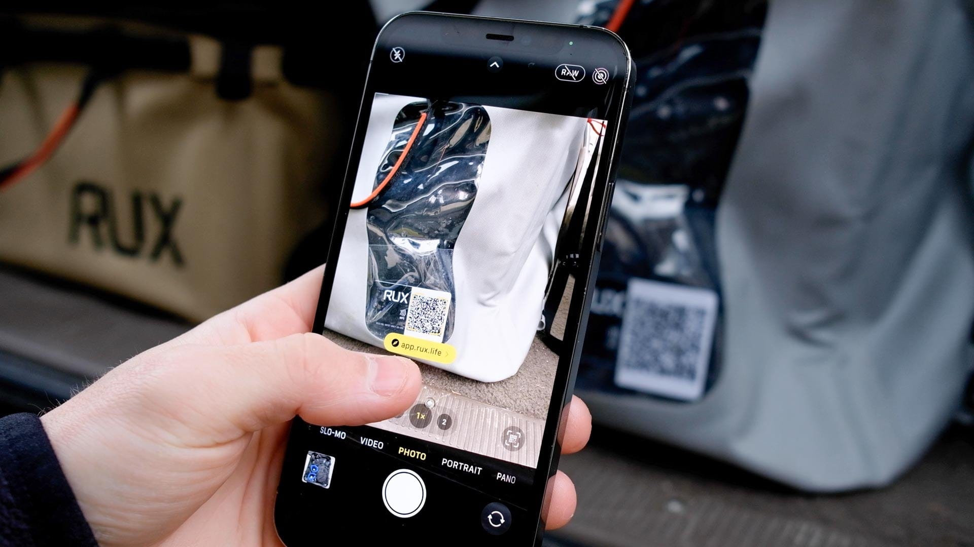 Scanning the RUX 70L QR code to access the RUX App